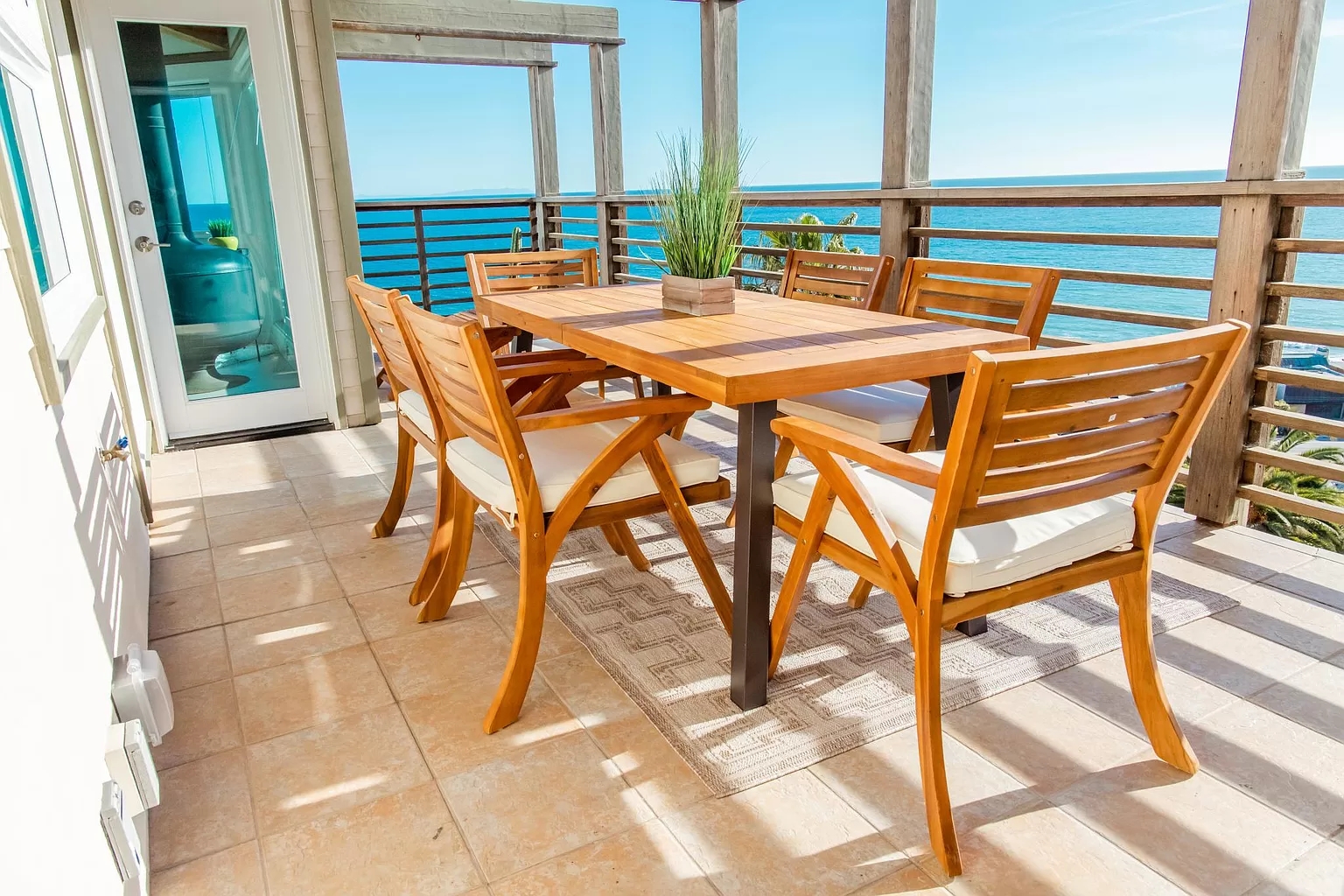 Ocean-view deck and dining area, previous Amiam residence